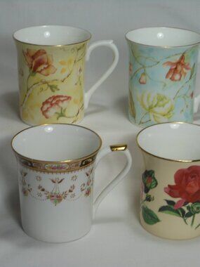 4 beautiful Queens fine bone china floral coffee mugs